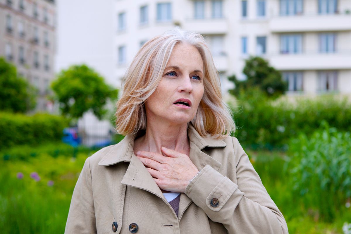 A woman struggles with breathlessness (file image)