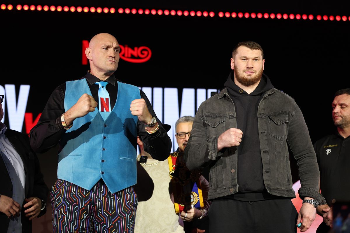 LONDON, ENGLAND - FEBRUARY 16: Tyson Fury and Arslanbek Makhmudov pose for a photo during the Tyson Fury v Arslanbek Makhmudov press conference at Tottenham Hotspur Stadium on February 16, 2026 in London, England. (Photo by Harry Murphy/Getty Images)