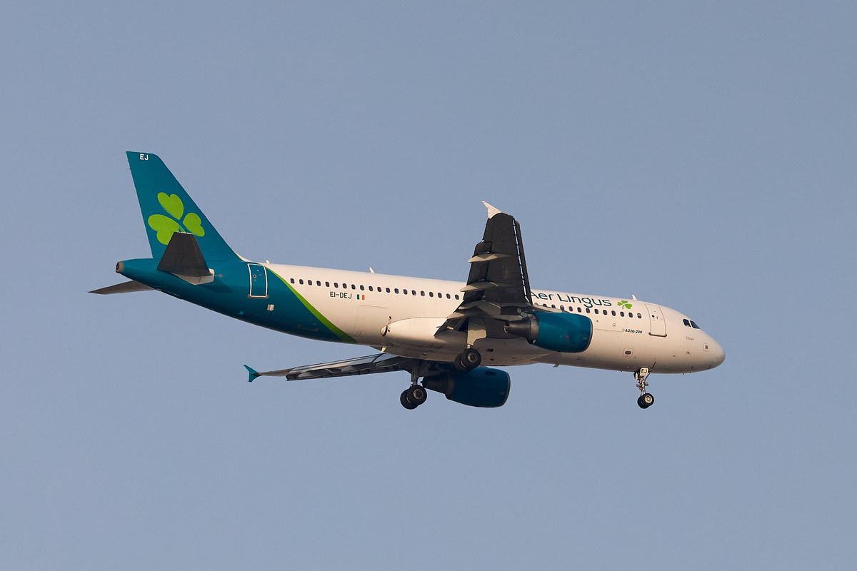 An EI-DEJ Aer Lingus Airbus A320-200 flies over the match venue ahead of the UEFA Conference League Play-offs, 1st leg soccer match between Hamrun Spartans FC and FK RFS at the National Stadium in Ta' Qali, Malta, on August 21, 2025. (Photo by Domenic Aquilina/NurPhoto via Getty Images)