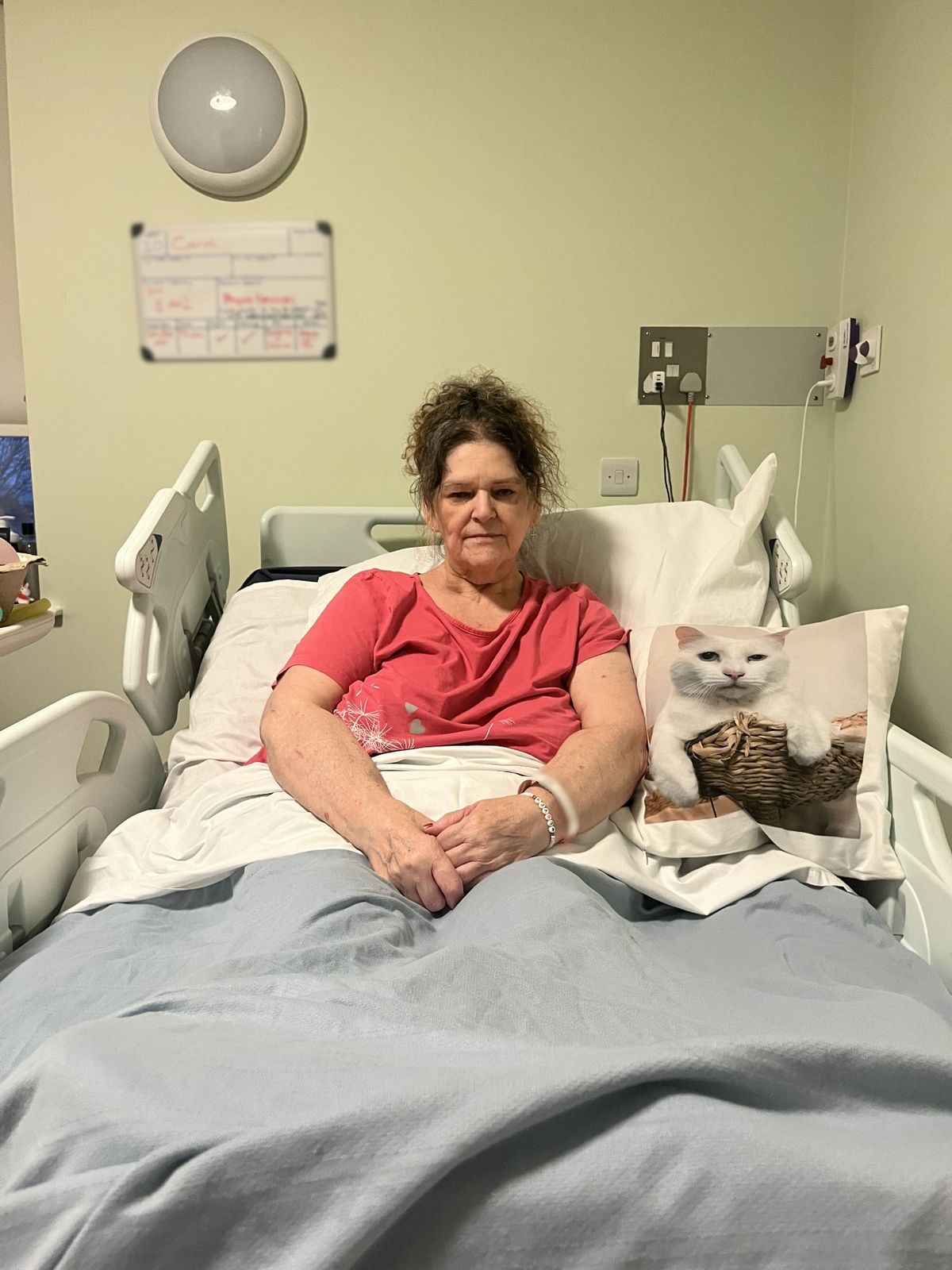 Carol in a hospital bed