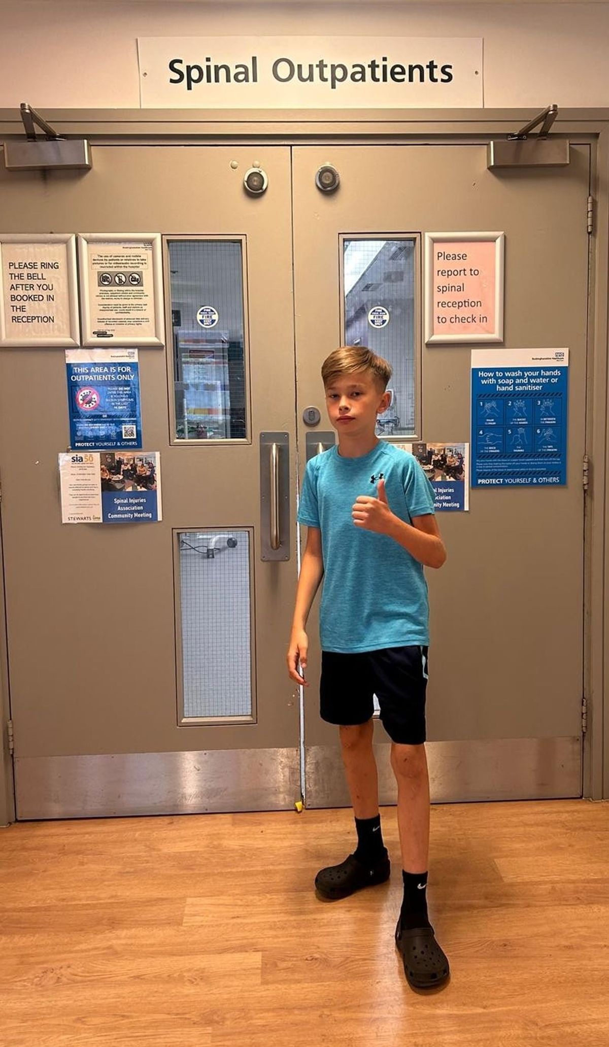 James outside a hospital ward