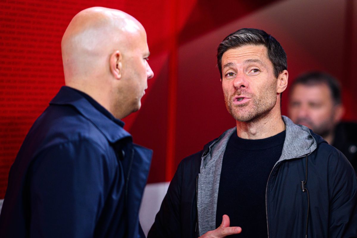 LIVERPOOL, ENGLAND - NOVEMBER 5: (L-R) Arne Slot of Liverpool and headcoach Xabi Alonso of Leverkusen  after the UEFA Champions League 2024/25 League Phase MD4 match between Liverpool FC and Bayer 04 Leverkusen at Anfield on November 5, 2024 in Liverpool, United Kingdom. (Photo by Jörg Schüler/Bayer 04 Leverkusen via Getty Images)