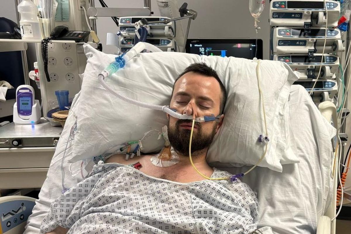 David Ross is pictured in hospital recovering from sepsis