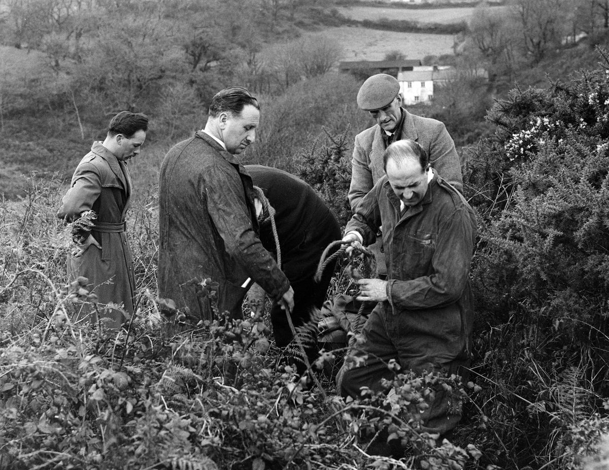 A detective is about to descend the shaft into the old Gower lead mine where where the skeleton was found
