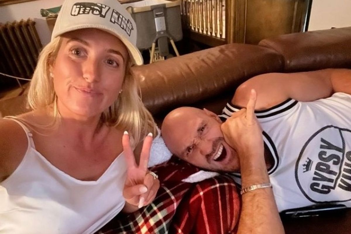 Tyson and Paris Fury pose for a photo