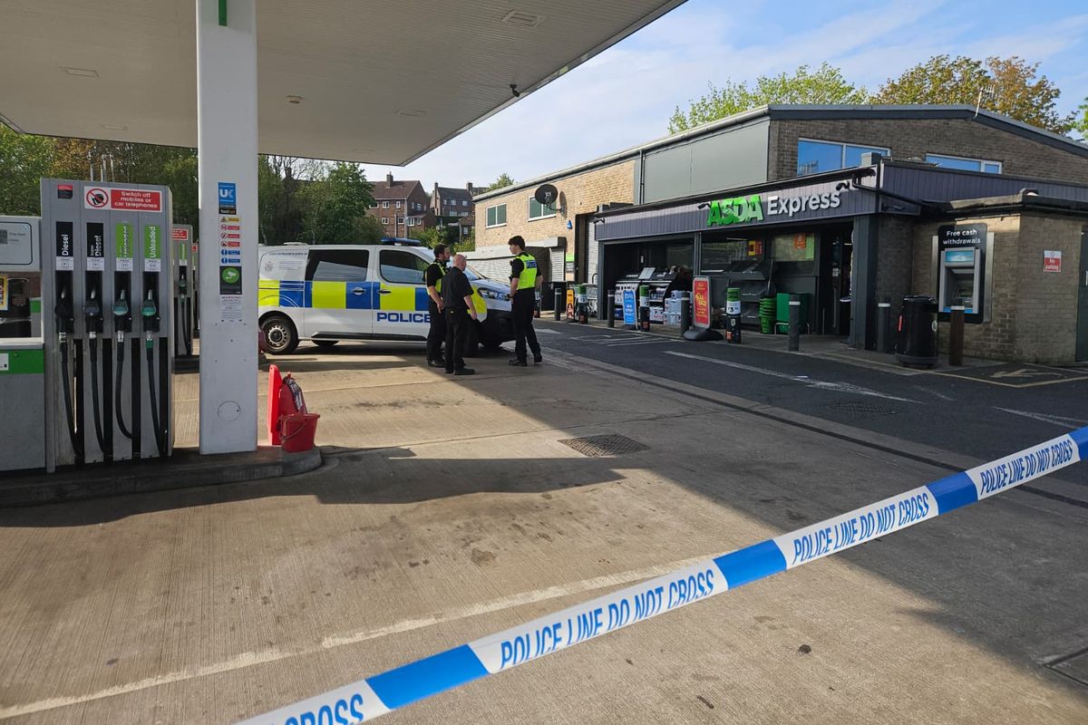 Police officers in attendance with a cordon in place at Asda Express petrol station in Prudhoe on Sunday morning