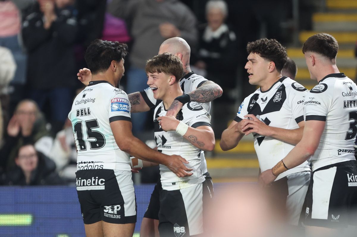 Hull FC celebrate Logan Moy's try. 