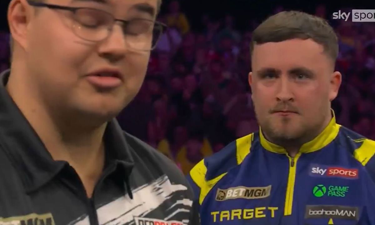 Luke Littler stares at Gian van Veen