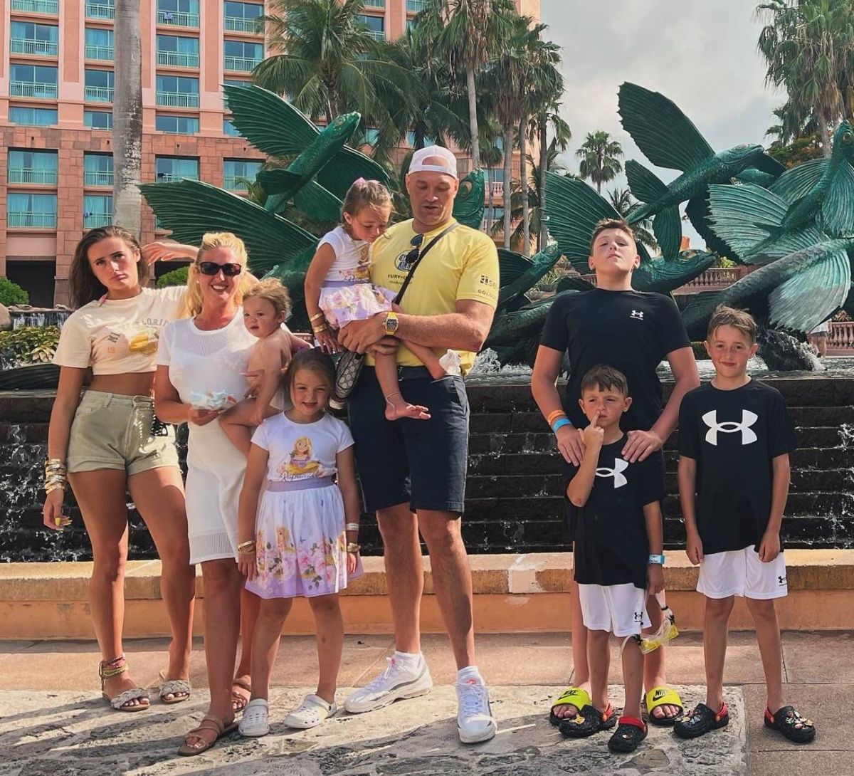 The Fury family on holiday - L-R Venezuela Fury, Paris Fury, Prince Rico Paris (held by Paris), Valencia, Athena (held by Tyson), Tyson Fury, Prince John James (eldest son at the back), Prince Adonis and  Prince Tyson II