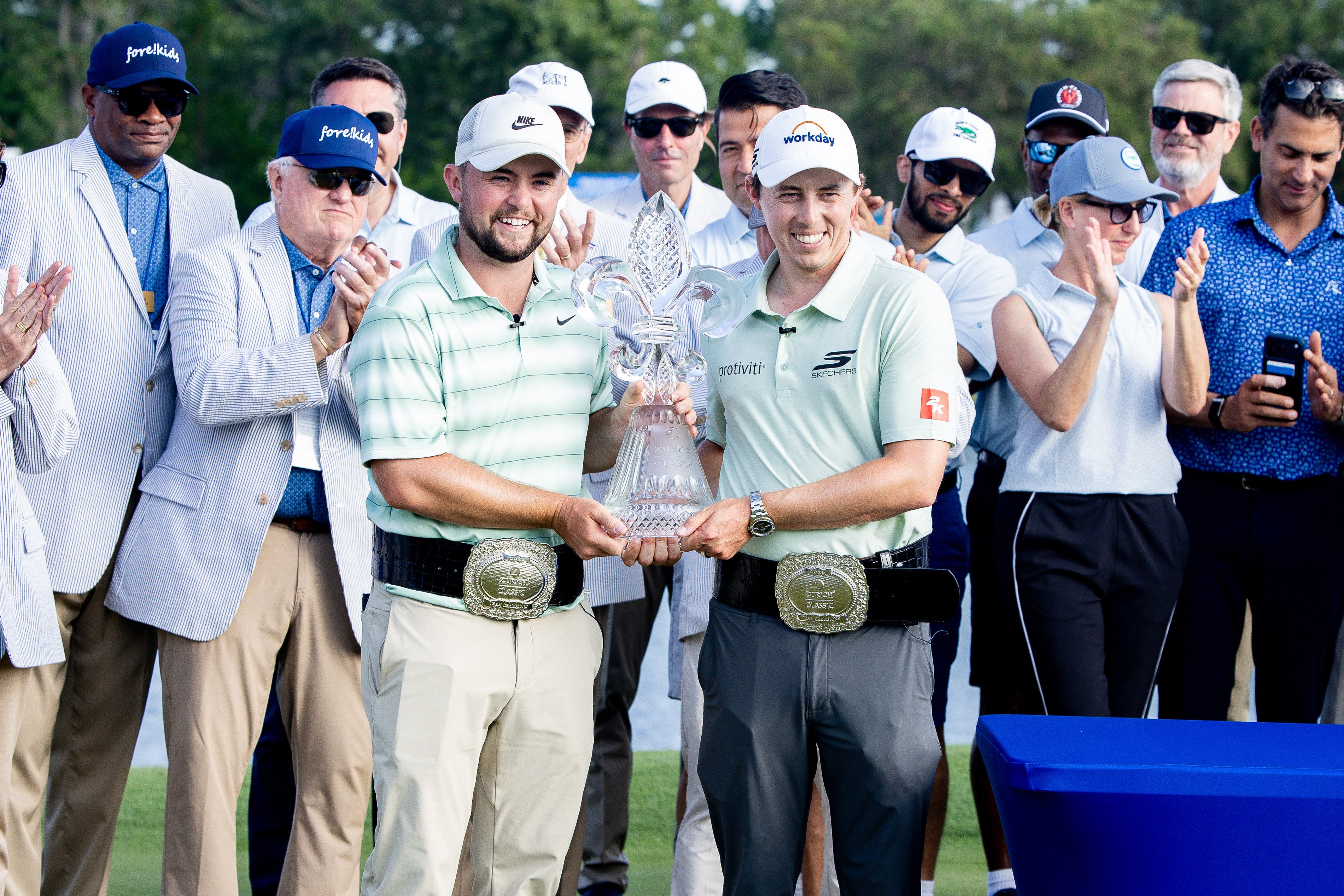 Matt and Alex Fitzpatrick hold their Zurich Classic title