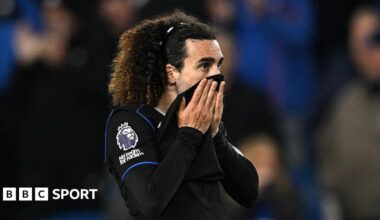 Marc Cucurella pulls his shirt up over his mouth after defeat at Brighton