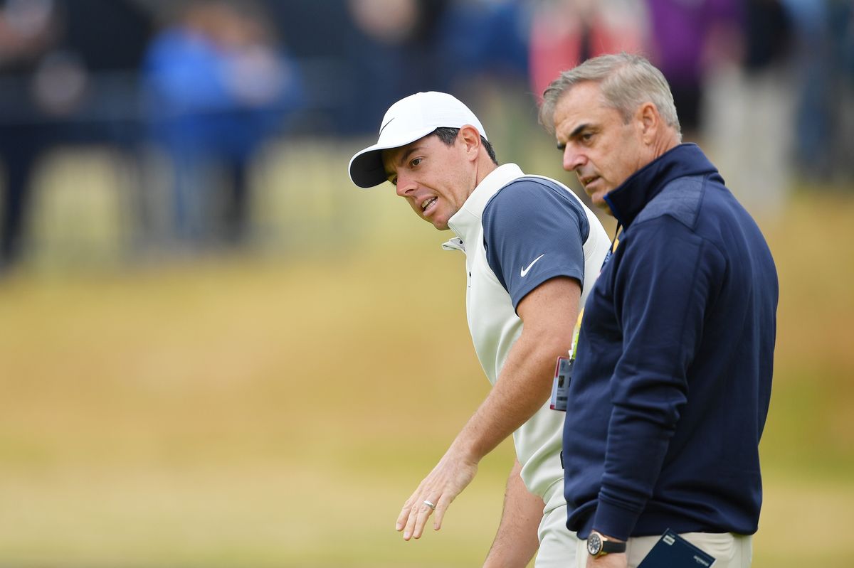  Rory McIlroy of Northern Ireland with Paul McGinley during previews to the 147th Open Championship at Carnoustie Golf Club on July 18, 2018 in Carnoustie, Scotland. 