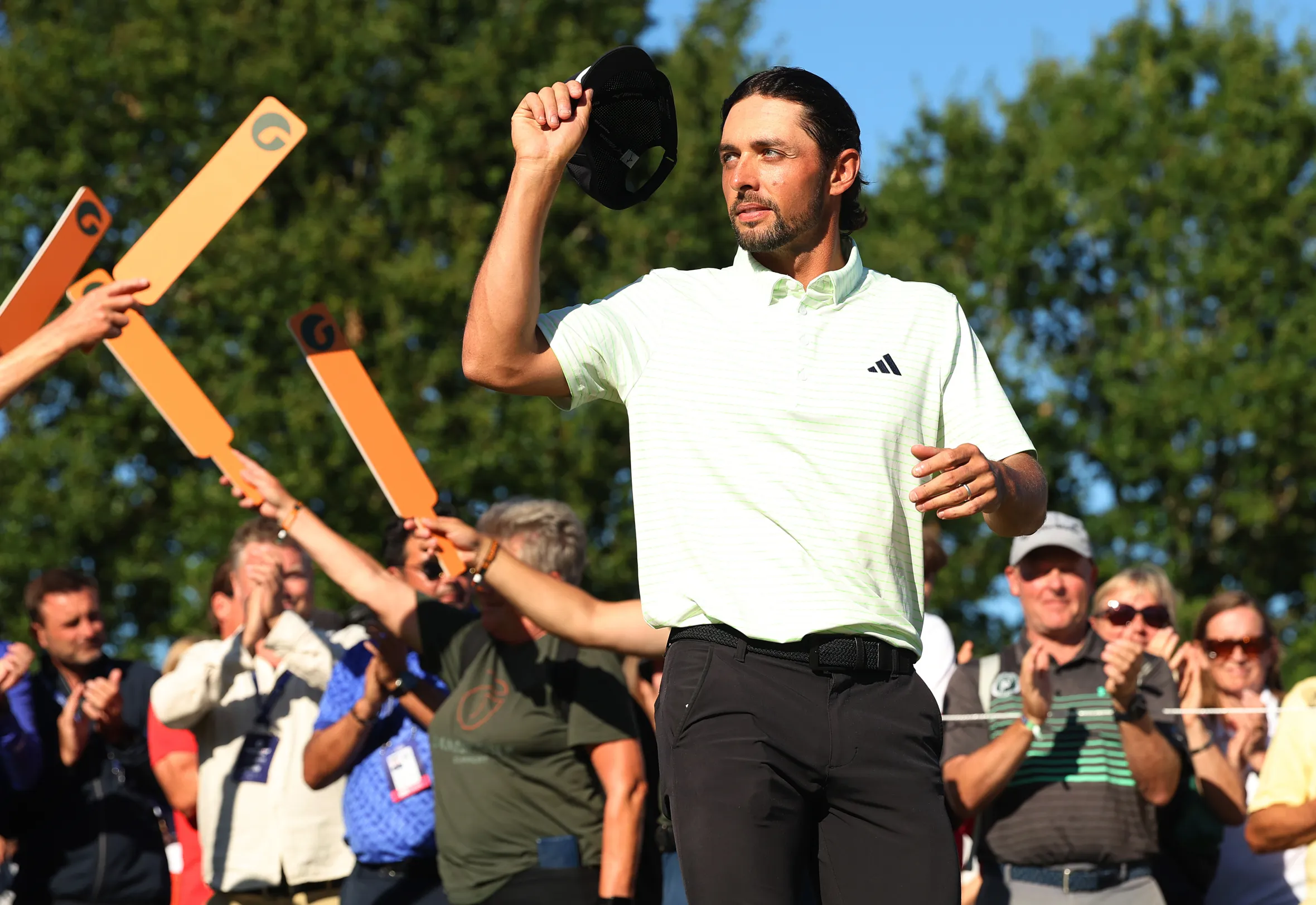 Marco Penge of England acknowledges the crowd on the 18th green after winning the Danish Golf Championship 2025.
