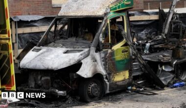 The burnt out shell of one of the ambulances
