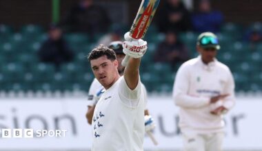 Tom Clark celebrates reaching his century against Leicestershire