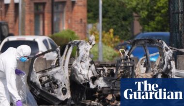 New IRA suspected over car explosion outside Belfast police station | Northern Ireland