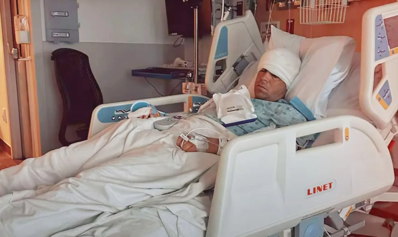 Gary Woodland in a hospital bed.