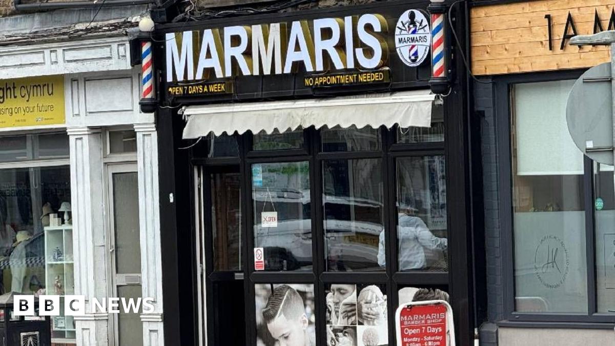 Shop front of a barber shop in Caerphilly County, south Wales. Marnaris barber shop was the scene of a mass brawl involving several men who were fighting over plans to open a new barber shop in nearby Newbridge.