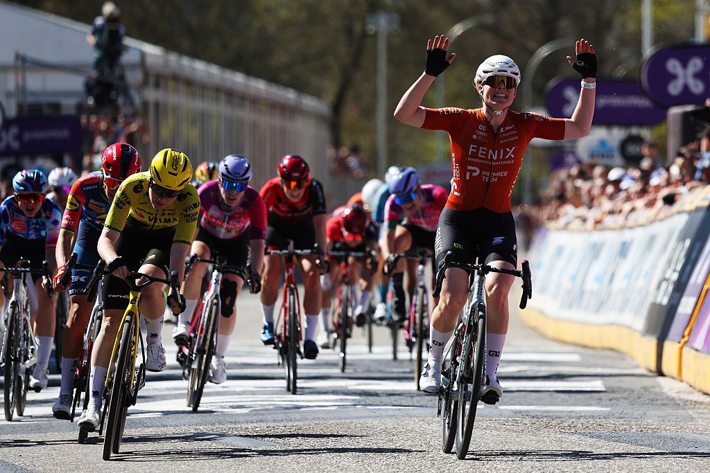 SCHOTEN, BELGIUM - APRIL 08: Charlotte Kool of Netherlands and Team Fenix-Premier Tech (R) celebrates at finish line as stage winner ahead of Nienke Veenhoven of Netherlands and Team Visma