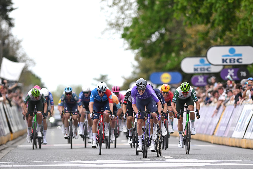 Romain Gregoire of France and Team Groupama - FDJ United, race winner Anders Foldager of Denmark and Team Jayco AlUla and Eduard Prades of Spain and Team Caja Rural - Seguros RGA sprint at the finish line during the 65th De Brabantse Pijl - La Fleche Brabanconne 2026
