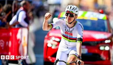Tadej Pogacar celebrates winning the Liege-Bastogne-Leige