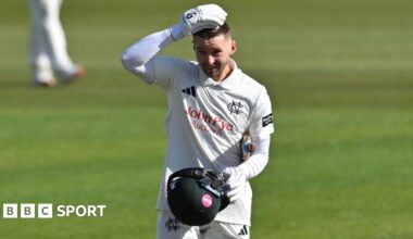 Joe Clarke celebrates with his helmet off for Nottinghamshire after scoring a century against Glamorgan