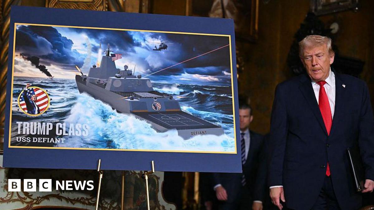 Donald Trump next to an image of the new Trum-class battleships.