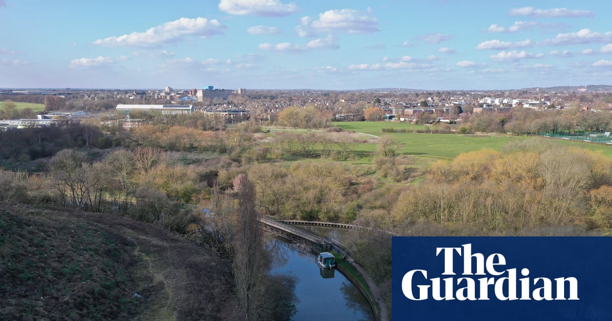 Woman and child die after getting into ‘difficulty’ in water in west London | UK news