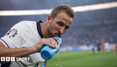 England captain Harry Kane drinks from a water bottle