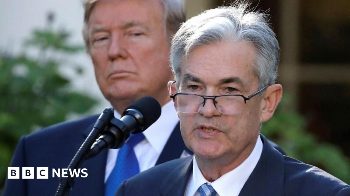 Donald Trump looks on as Jerome Powell speaks at the White House in  November 2017