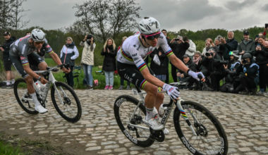 Alpecin-Deceuninck's Dutch rider Mathieu van der Poel (L) and UAE Team Emirates Slovenian rider Tadej Pogacar cycle in a breakaway in a paved area during the 122nd edition of the Paris-Roubaix