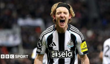 Harry Kane celebrates scoring England's second goal against Latvia with Anthony Gordon in October 2025.