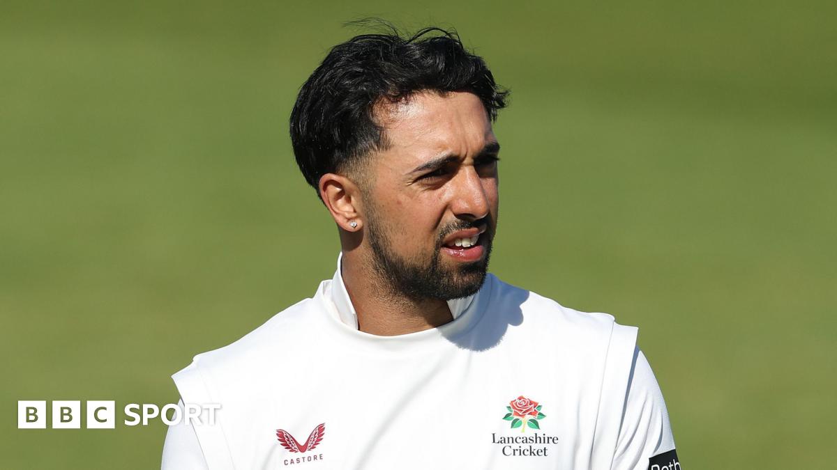 Ajeet Singh Dale looking to his left while out in the field during Lancashire's Championship game away to Northants