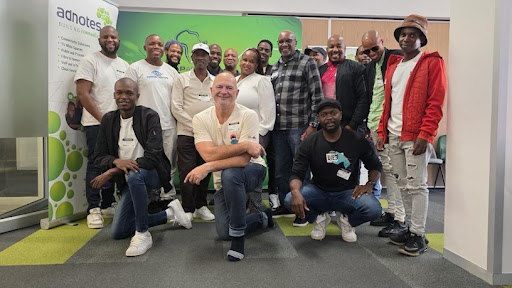 The 25 LCNOs participants gather after a training session that equips them with technical and operational skills to expand reliable internet access across surrounding regions.