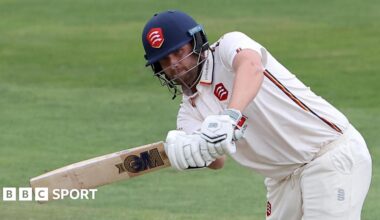 Matt Critchley swings the bat in two hands during a match
