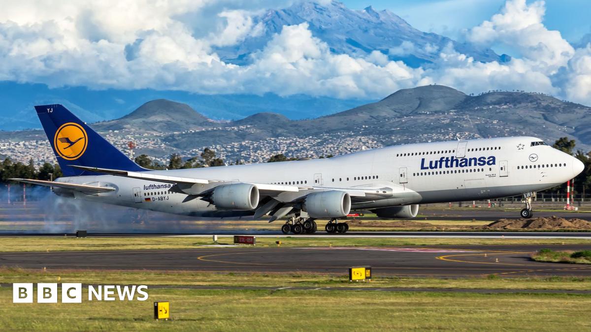 Parked Lufthansa aircraft are lined up at Frankfurt Airport on April 13, 2026.