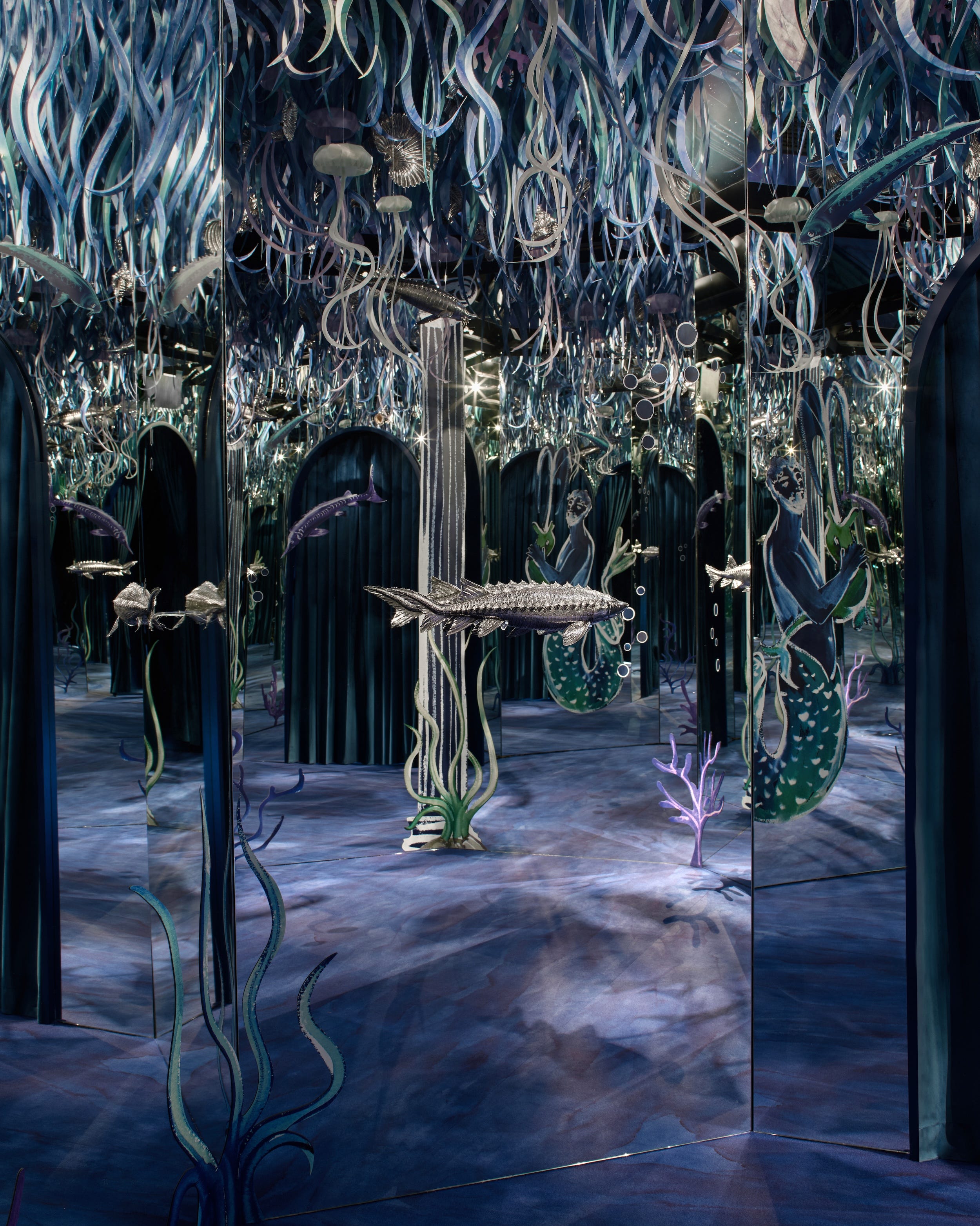 underwater themed installation with mirrored surfaces