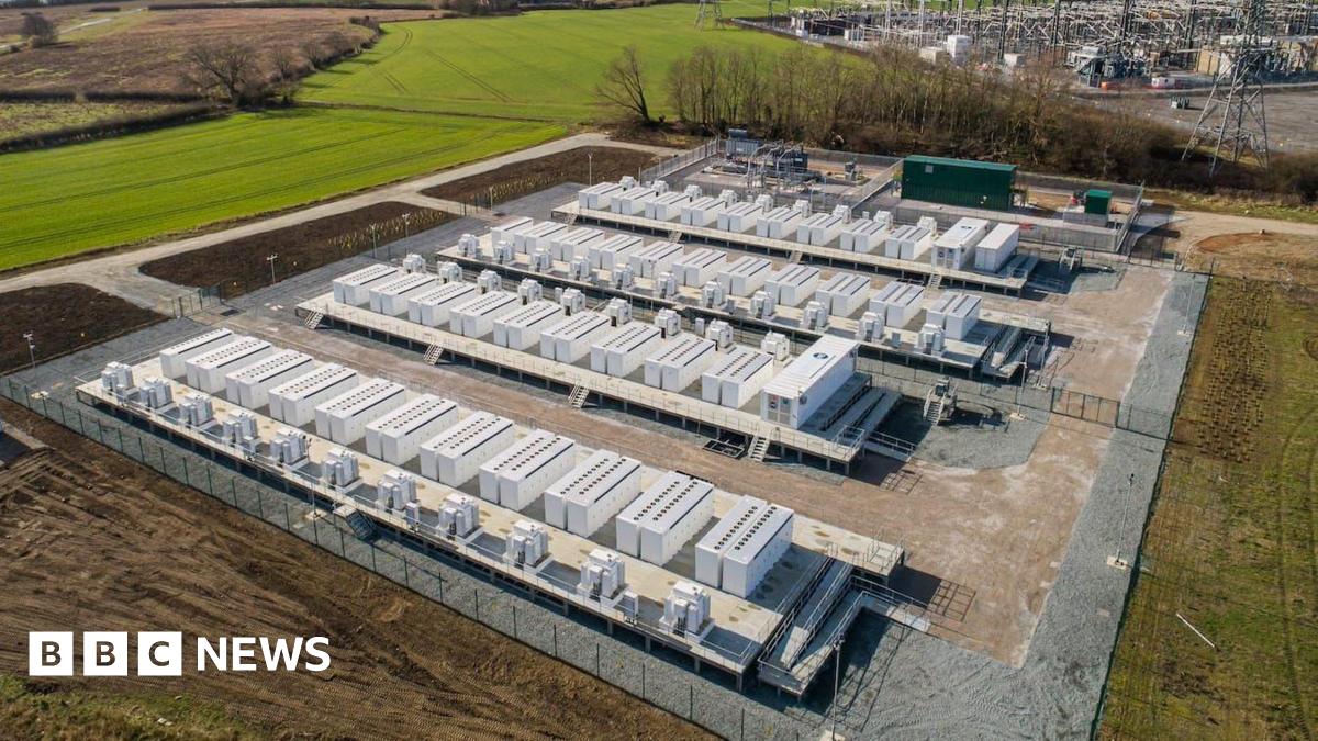 A computer-generated image showing many rows of white rectangular prisms taking up a field.