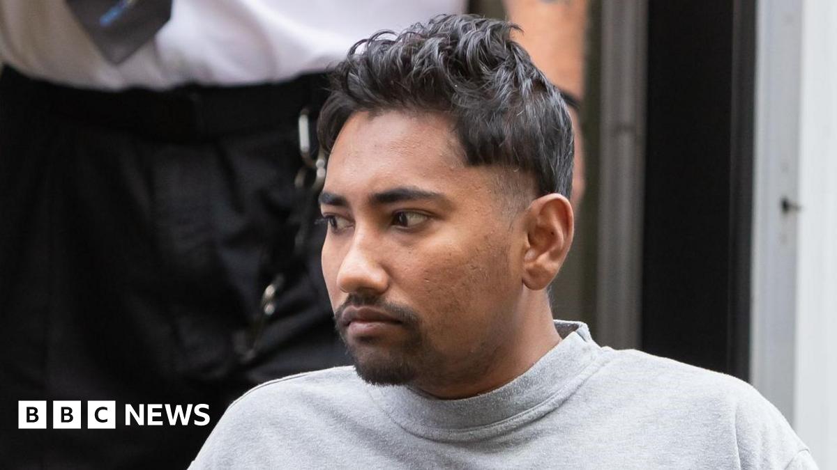 Man with trimmed beard and wearing a grey sweatshirt is pictured outside Cardiff Crown Court