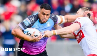 Sam Lisone carries the ball up with determination against Hull KR