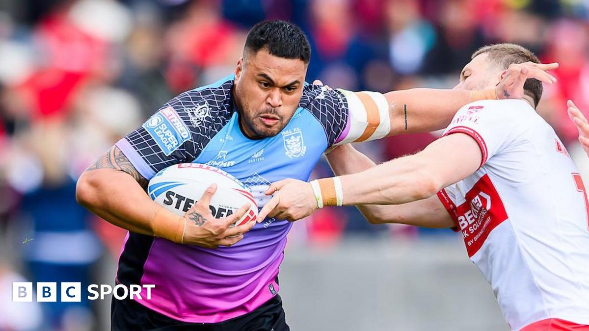 Sam Lisone carries the ball up with determination against Hull KR