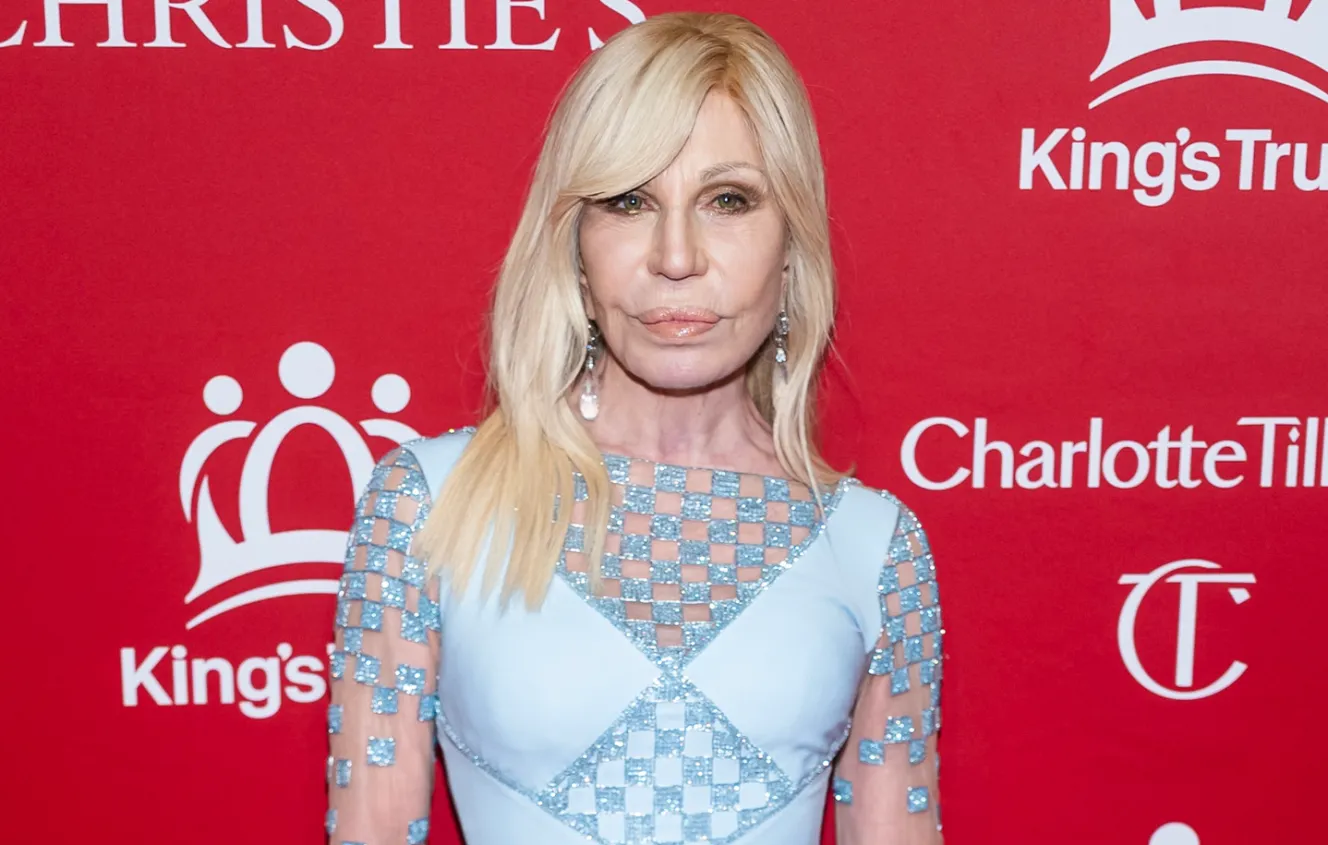 Donatella Versace in a light blue gown with checkerboard embellishments at The King's Trust 5th annual gala.