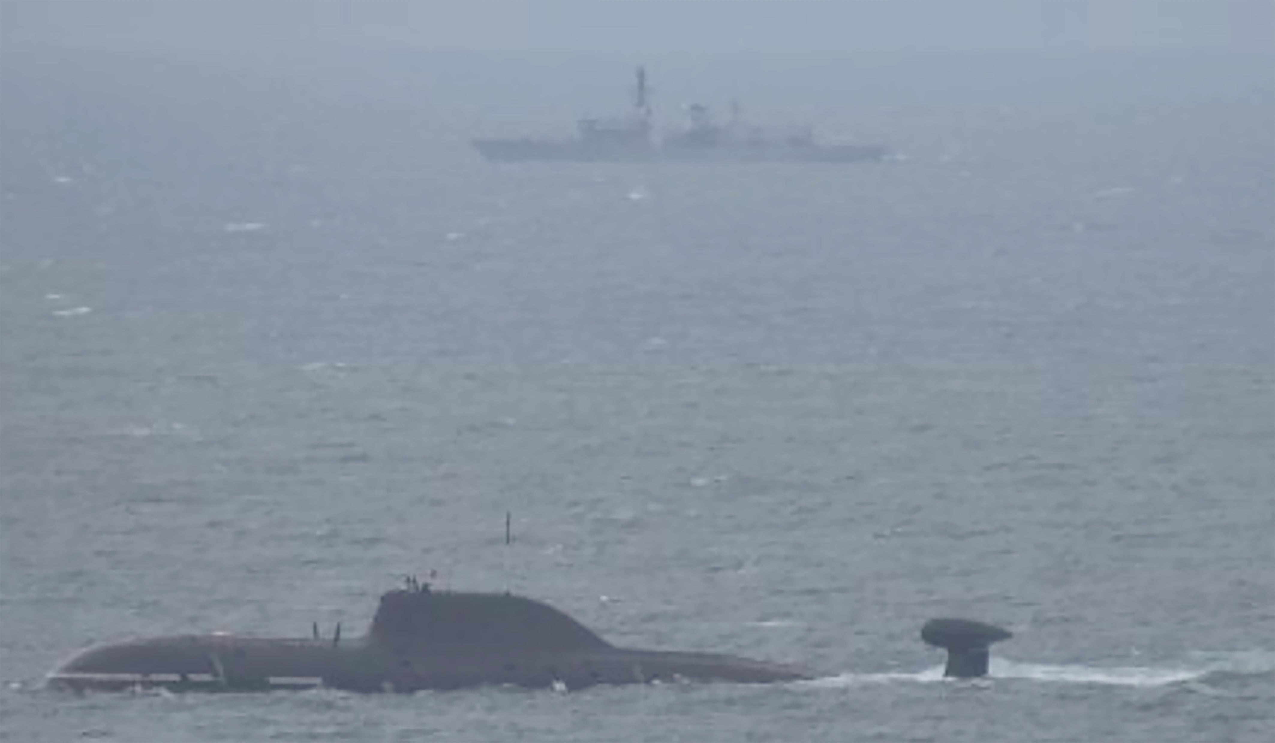 British submarine hunter HMS Portland (top) tracking Akula-class attack submarine Vepr in the North Sea, northwest of Bergen, Norway
