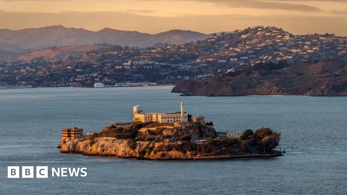 A stock image of Alcatraz prison, showing a building sitting on an island