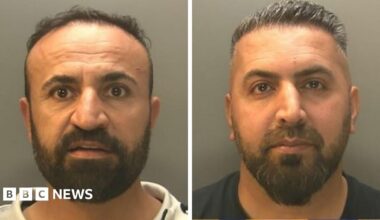 Police mugshot of Dilshad Shamo and Ali Khdir. Shamo is on the left and had a beard and is looking at the camera. Khdir is on the right and is wearing a dark blue t-shirt, he also has a beard.