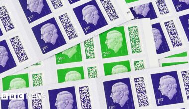 Rows of first and second class stamps