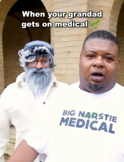 Big Narstie and a man dressed as an elderly man with a white beard and hat.