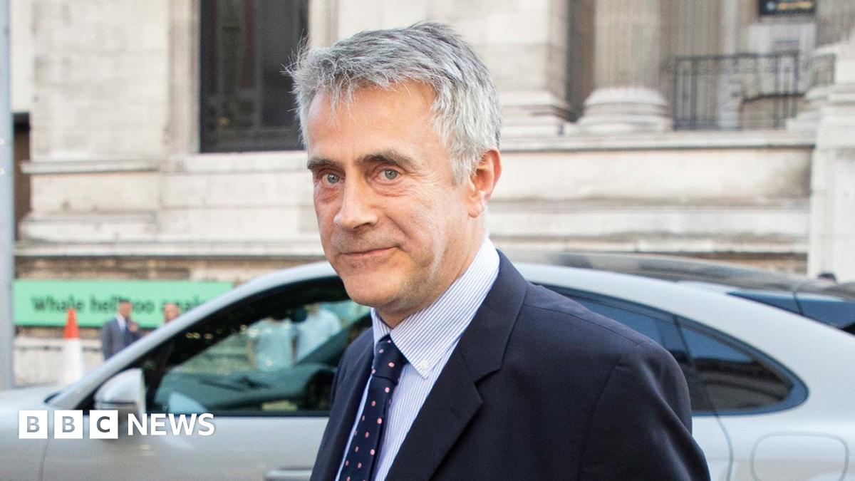 Christopher Harborne arrives at the Victoria and Albert Museum during the Conservative Party Summer Party in 2022. He is a middle aged man with short grey hair in a suit and tie