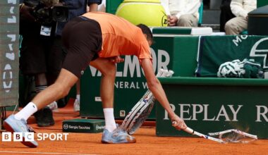 Daniil Medvedev smashes his racquet