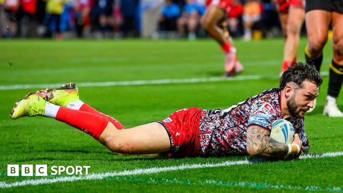 Gareth O'Brien crashes down with the ball to score a try for Leigh at the York Community Stadium